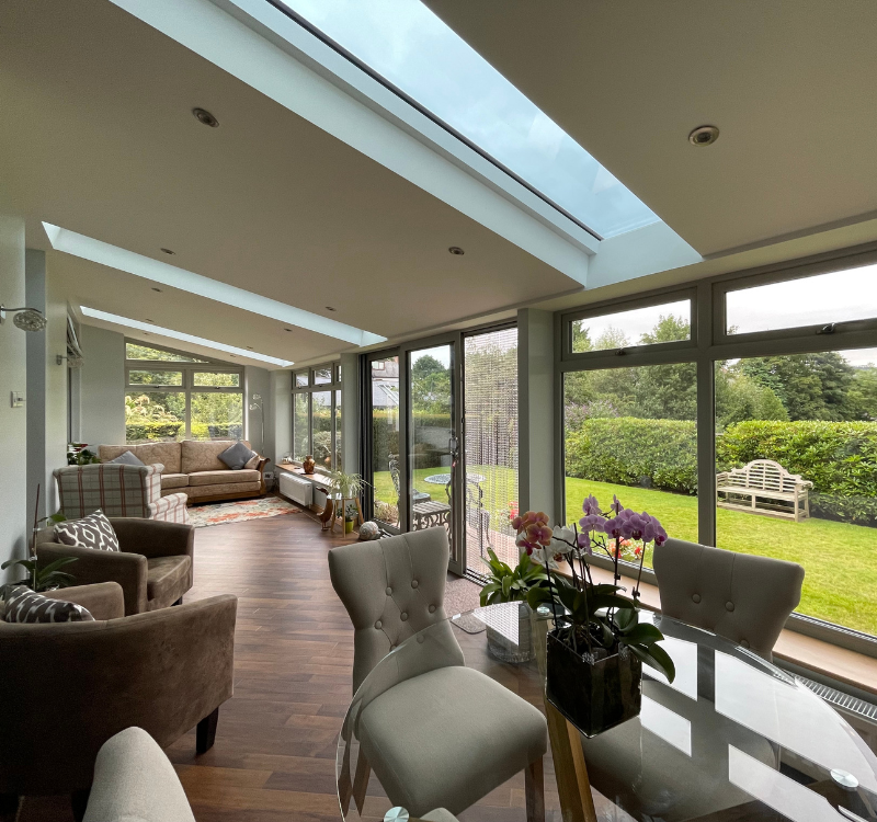 Sunroom with multiple large skylights and windows