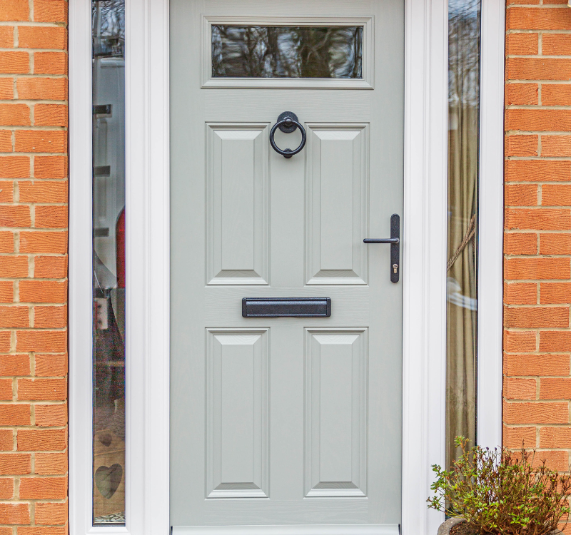 grey entrance door with black features