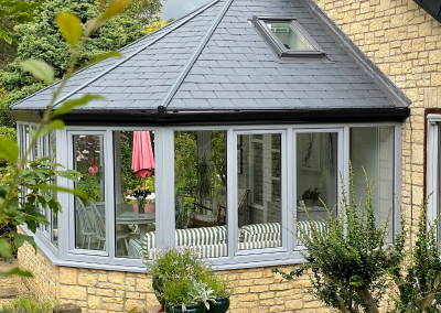 orangery with grey tiles and windows