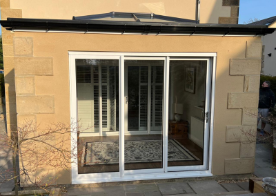 white bi-folding doors