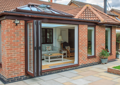 bi-folding doors with brown trim