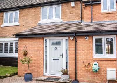 Front door of home with driveway