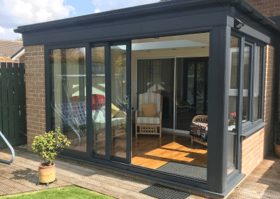 A black and beige rectangular orangery