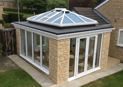 A Birdseye view of a sandstone and glass orangery