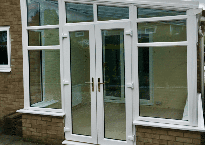 A glass, slanted roof conservatory