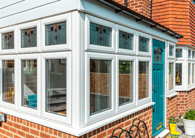 A surround of windows in a front porch