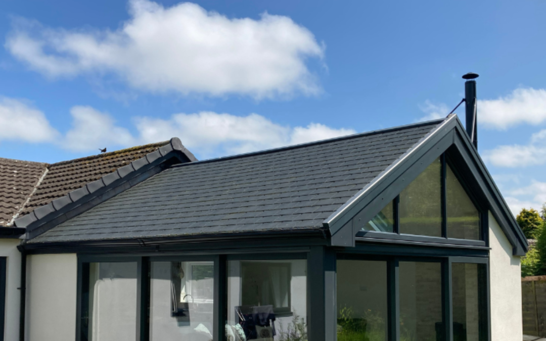 black trim bi fold doors with Hawthorns Roofline Solutions