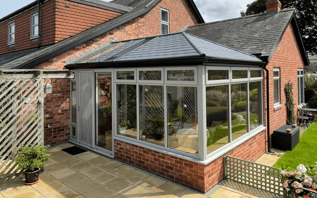 conservatory in Newcastle with black roof and grey window trim