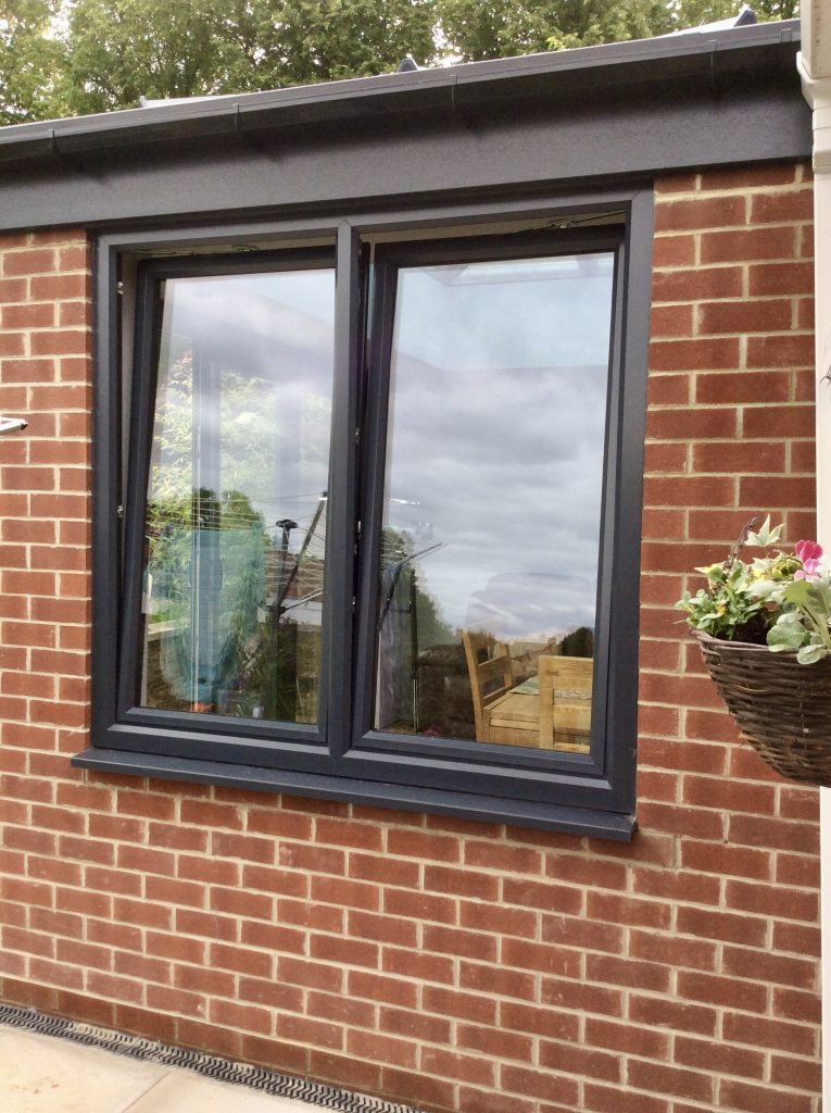 Tilt and turn window type showing inward opening mechanism
